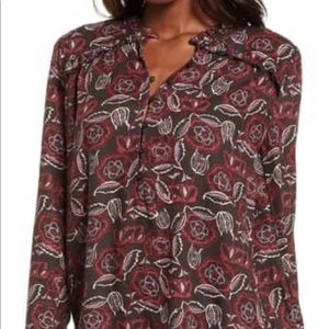 Ruffle detail blouse.